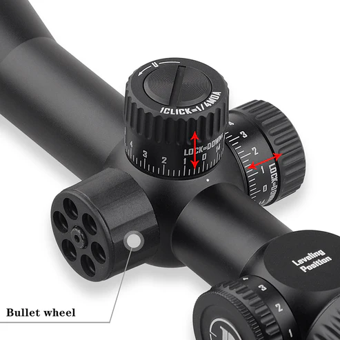 6_6d761a1e-c082-4afa-919c-2bd5ac4ad67d Close-up of a riflescope's elevation and windage adjustment dials with a bullet wheel label.