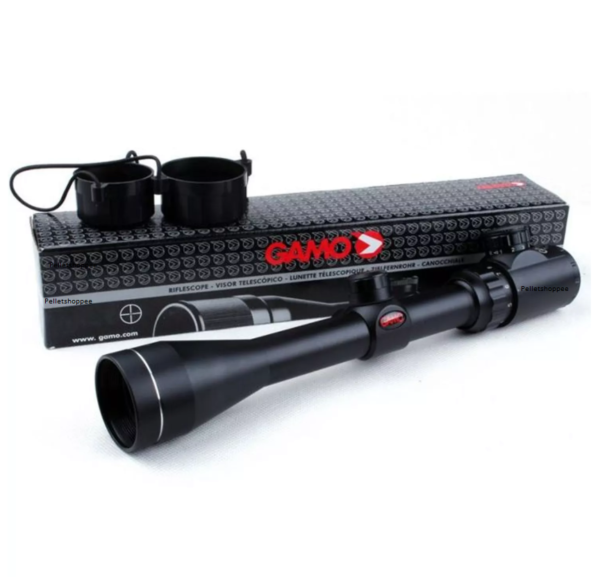 Black telescopic rifle scope with mounting rings on a patterned box, ready for use with a rifle or airgun.