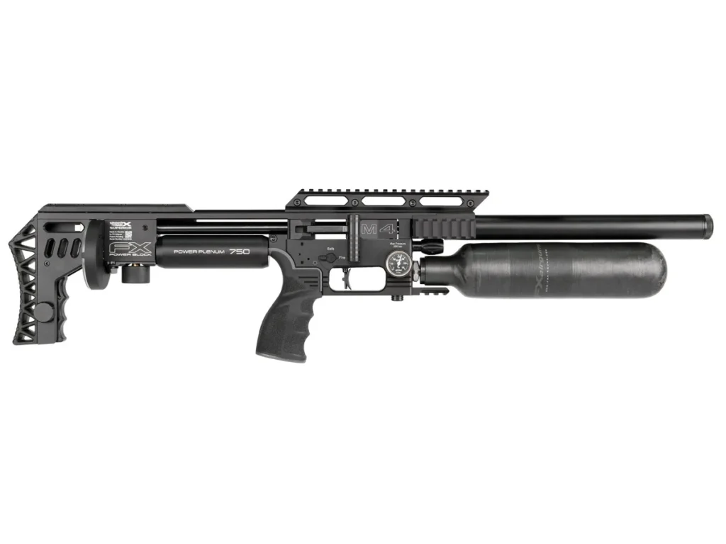 Side view of a black tactical air rifle with an external air tank and Picatinny rails on top and a folding stock