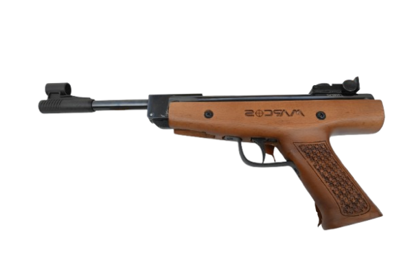 Side view of a small break-barrel air pistol with a wooden grip and black metal barrel.