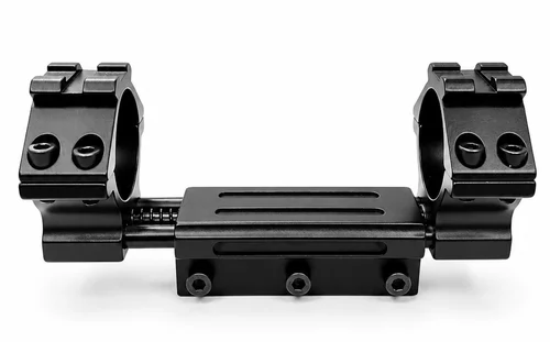 Black double scope mount with two ring clamps and a central Picatinny rail base, laid on a white background for attaching a scope to a rifle.