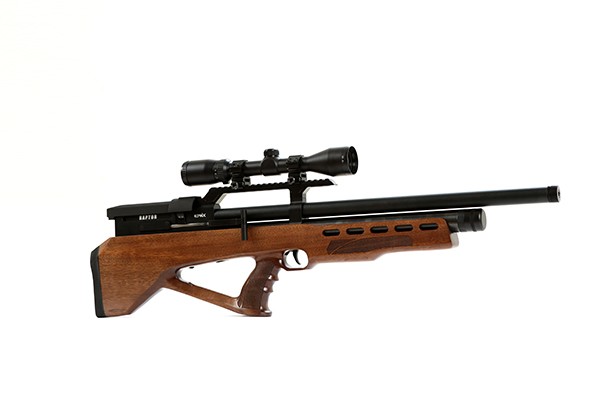 Bolt-action rifle with wooden stock and scope mounted on top